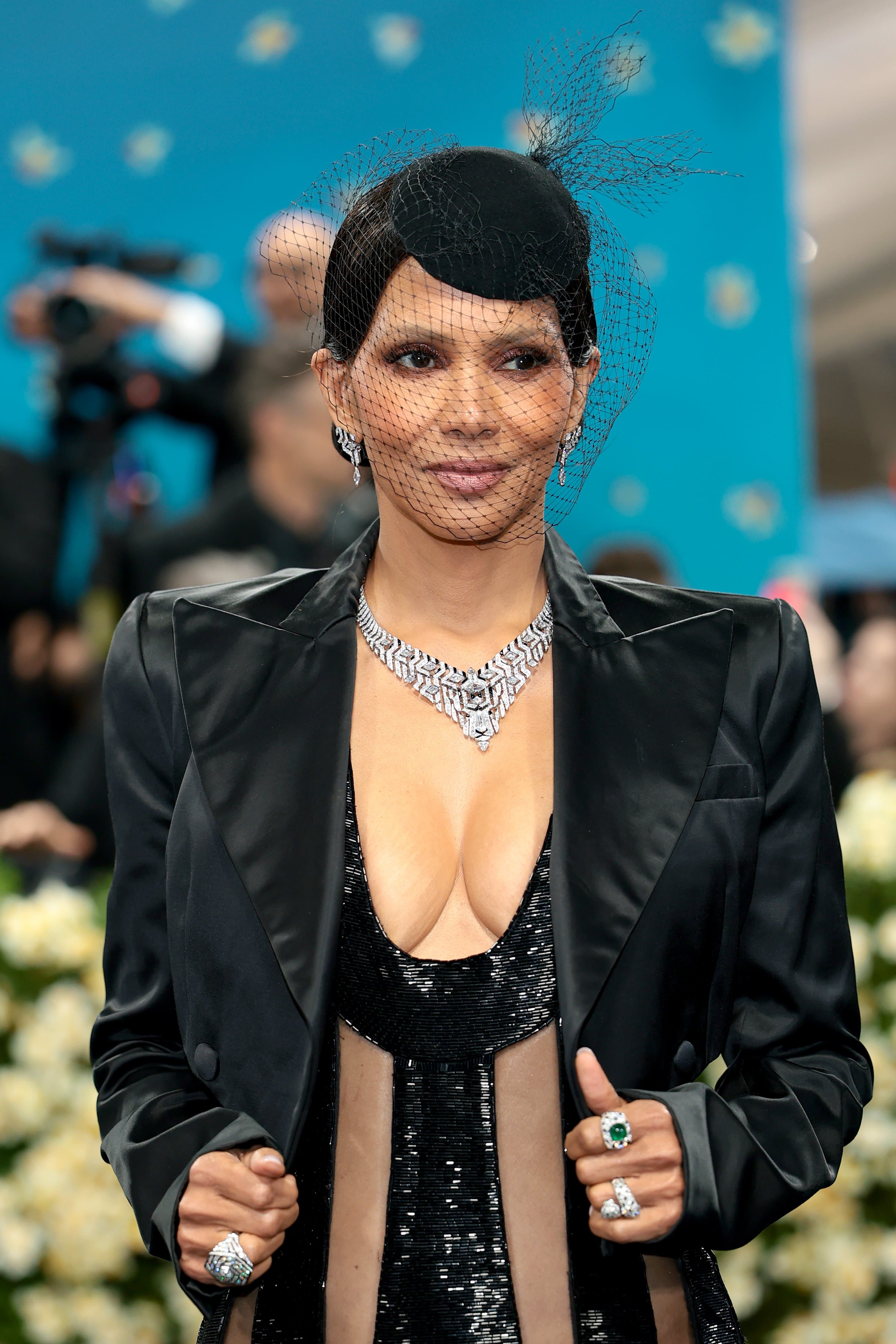 Cartier Tsagaan High Jewelry earrings | Cartier Tsagaan High Jewelry necklace | Panthère de Cartier ring | Panthère de Cartier ring | Cartier High Jewelry ring | Getty Images